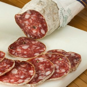 Dry-cured sausage with black pepper.