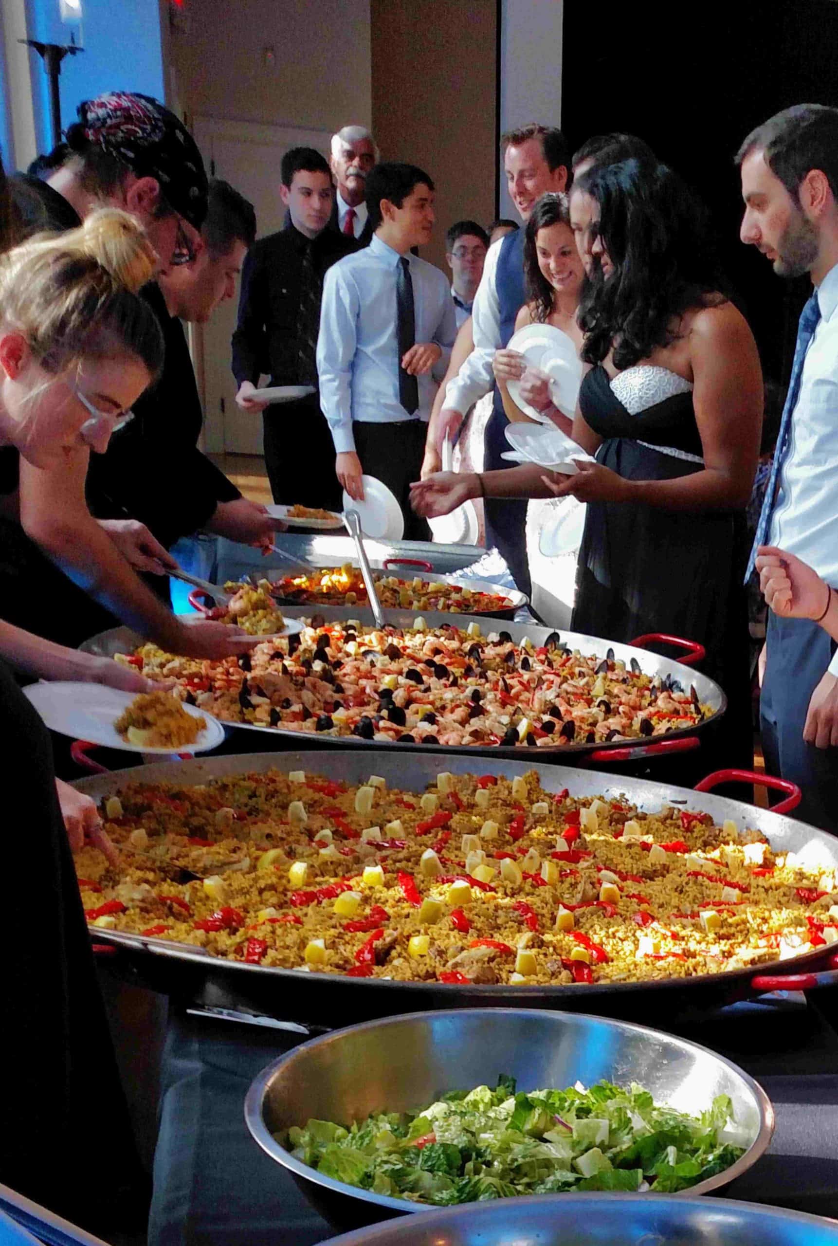 Serving Paella and salad