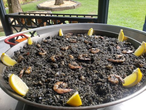 black paella catering